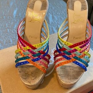 Authentic Christian Louboutin shoes.